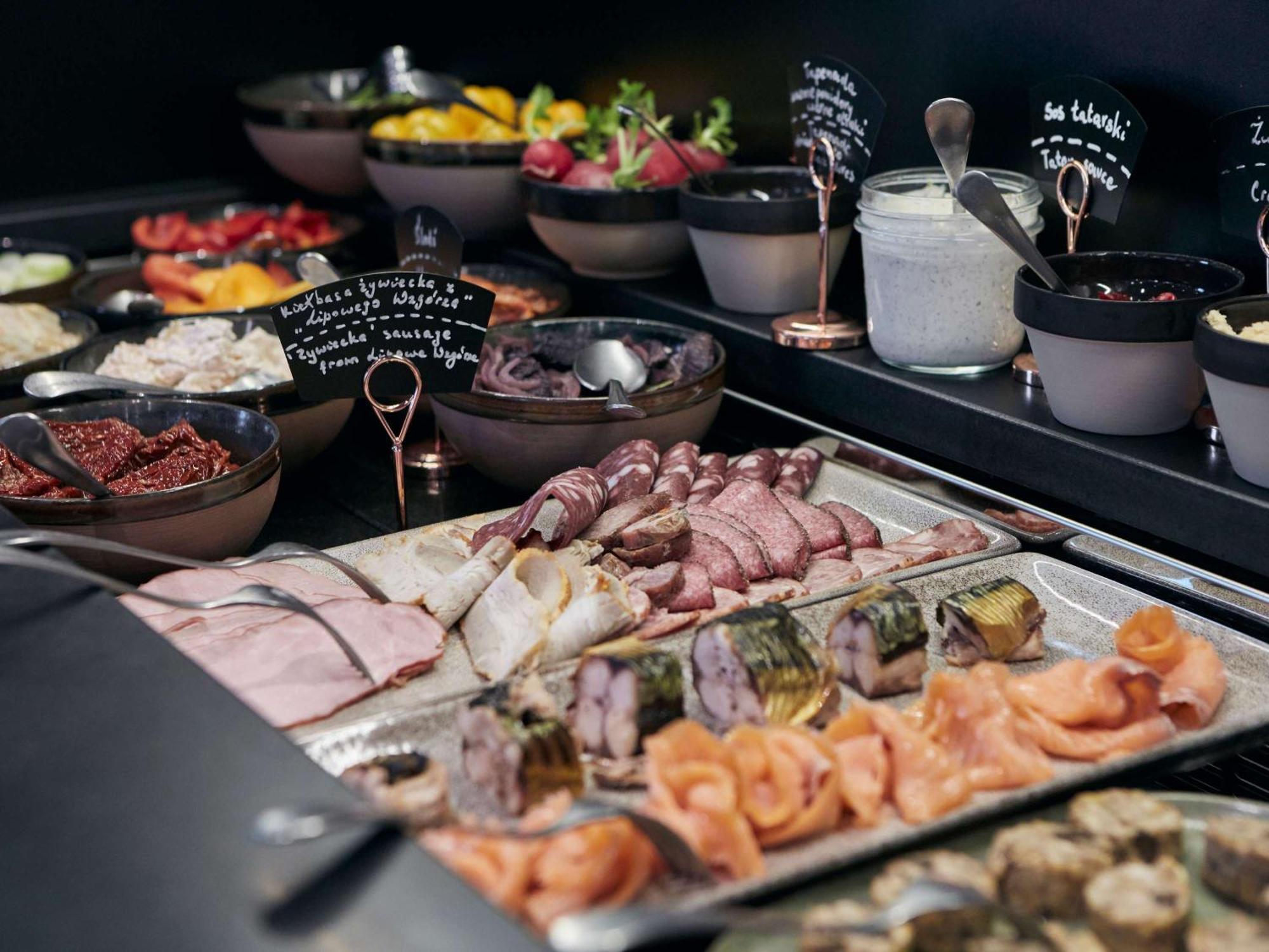 The Bridge Wroclaw - Mgallery Экстерьер фото A buffet at a restaurant